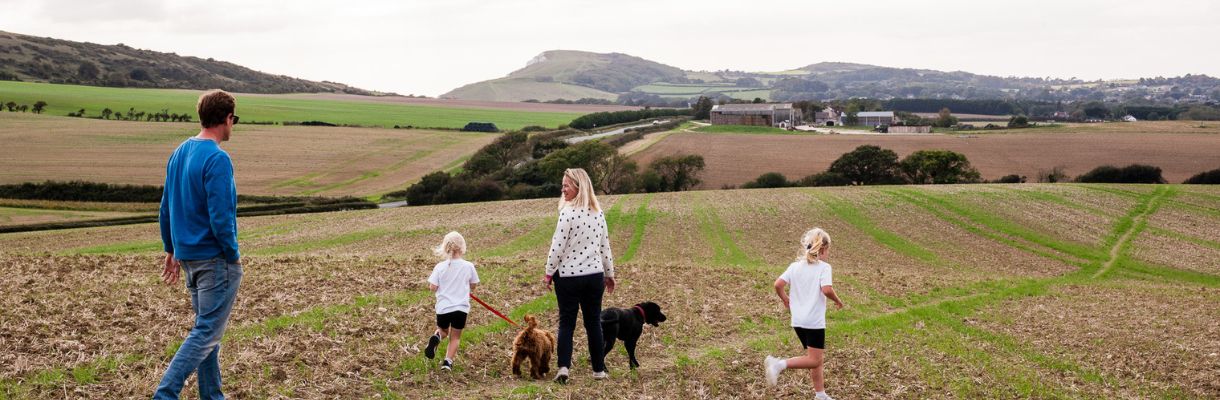 Family dog walk along The Tapnell Trail